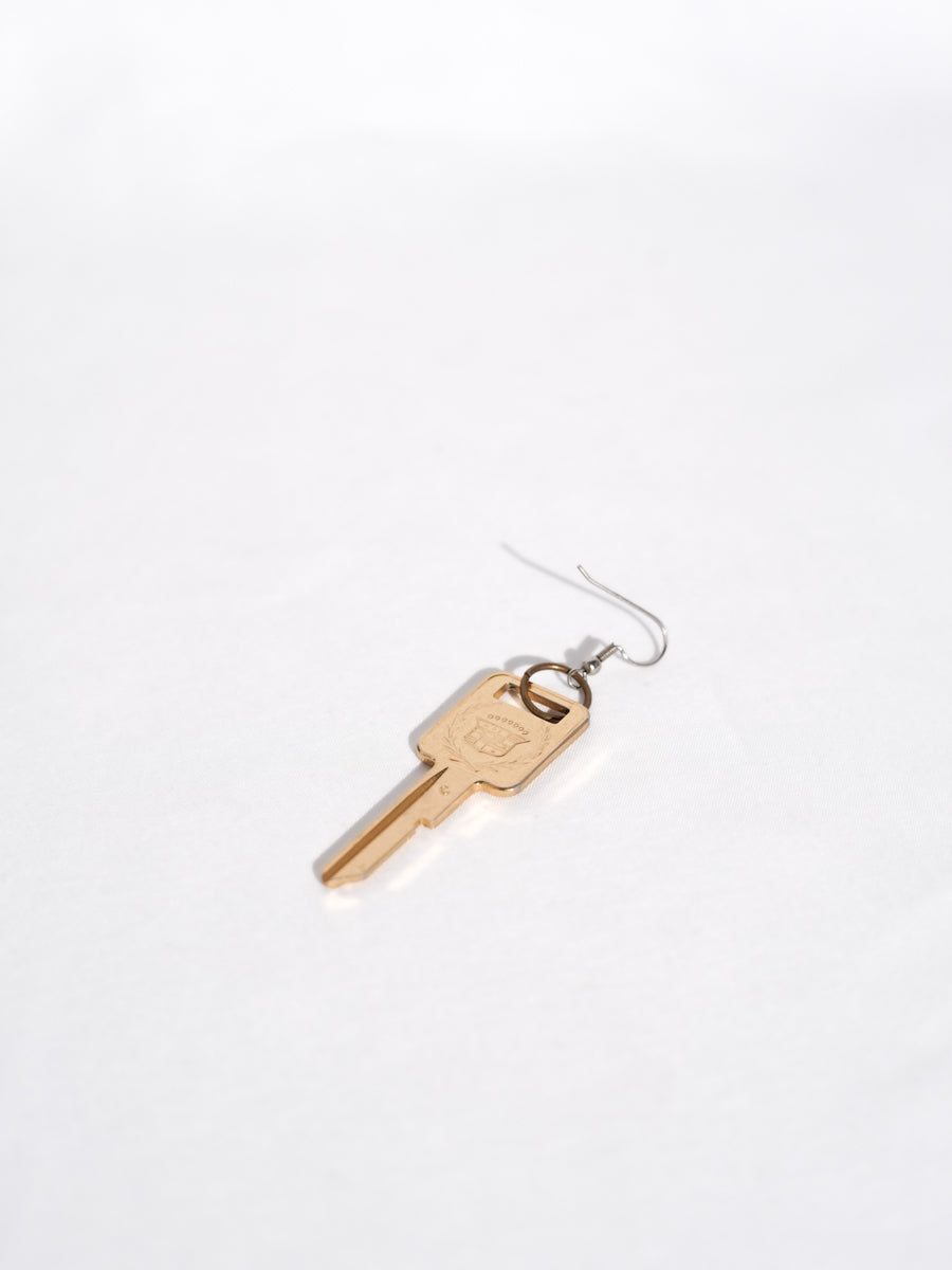 Cadilac gold single earring